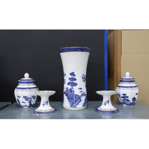 150 - Willow pattern blue and white dinner service and teaset together with a vase, candlesticks, etc tall... 