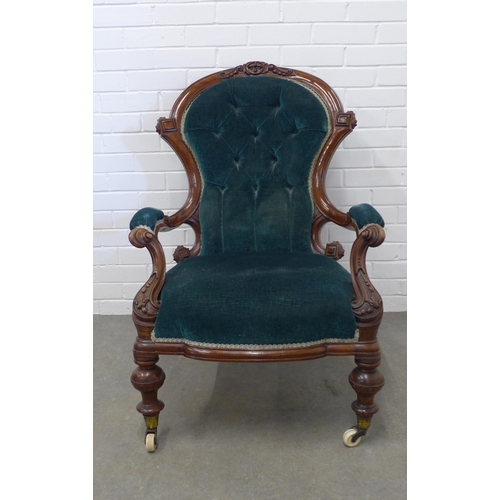 212 - Victorian mahogany framed open armchair, button back green upholstery on ceramic castors. 102 x 71 x... 