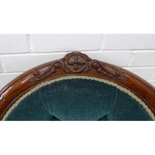 212 - Victorian mahogany framed open armchair, button back green upholstery on ceramic castors. 102 x 71 x... 