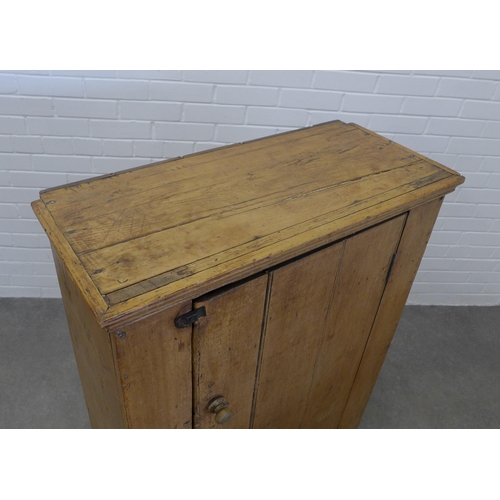 219 - Pine cupboard with shelved interior. 114 x 80 x 37cm.