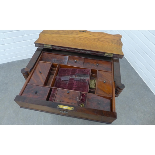 246 - 19th century rosewood sewing table, the serpentine top with a lift up section, opening to reveal a f... 