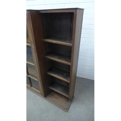 247 - Early 20th century breakfront bookcase with glazed central section flanked by open shelves, 153 x 15... 