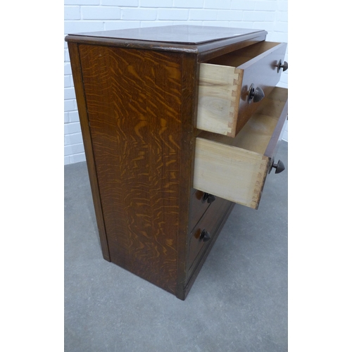 252 - Early 20th century oak chest with four long drawers and bun handels, plinth base, 92 x 75 x 41cm