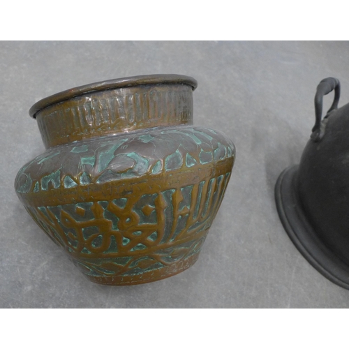 255 - Copper planter with an embossed Islamic  pattern, and a helmet shaped coal bucket (2)