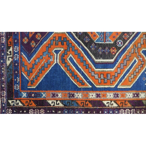 265 - Turkish rug, blue field with geometric borders, 155 x 110cm.