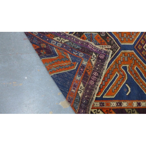 265 - Turkish rug, blue field with geometric borders, 155 x 110cm.