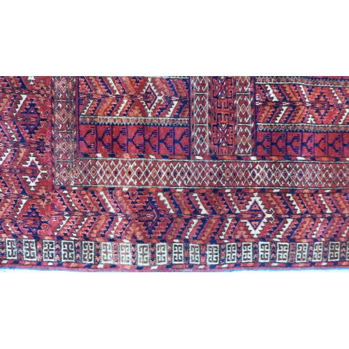 269 - Tekke prayer rug with red field and all-over geometric and serrated patterns,  135 x 127cm.