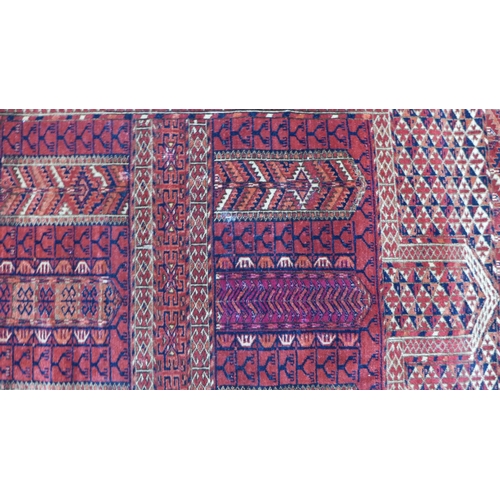 269 - Tekke prayer rug with red field and all-over geometric and serrated patterns,  135 x 127cm.