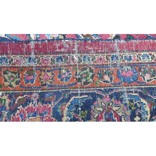 273 - Large Persian carpet with a central flowerhead medallion and allover foliate field, 250 x 350cm