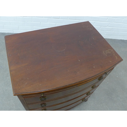 288 - Mahogany bow front chest of small proportions with a pull out slide and four long drawers, shaped ap... 