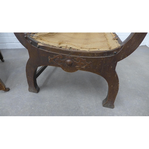 291 - Early 20th century oak  savonarola chair and another with open arms and embossed faux leather uphols... 