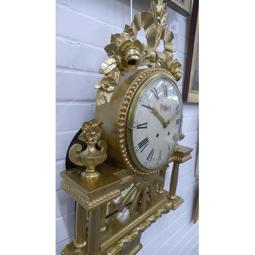 298 - French giltwood cartel wall clock, surmounted by roses with a cream dial with Roman numerals, 85cm l... 