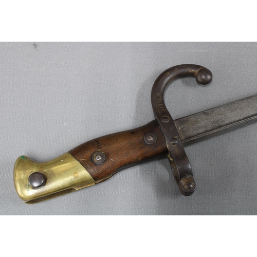 307 - French bayonet, inscribed on blade and dated 1876. Blade length 52cm