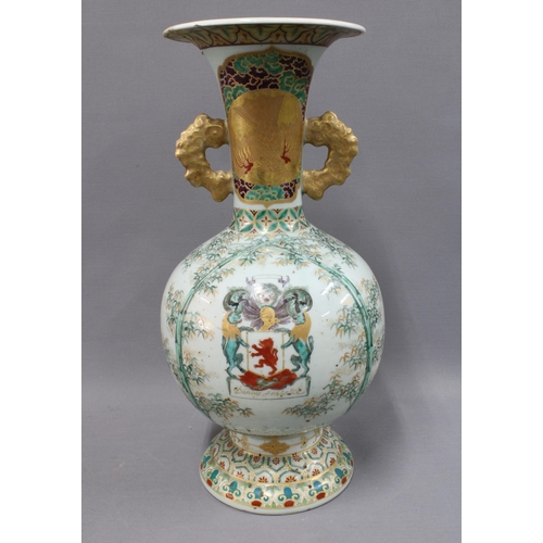 315 - Kakiemon style twin handled Armorial vase, likely late 19th century,  (restored) 47cm high