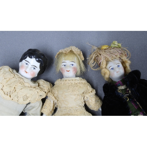 332 - A group of five Victorian and later bisque and china-head doll's house dolls, 18cm (5)