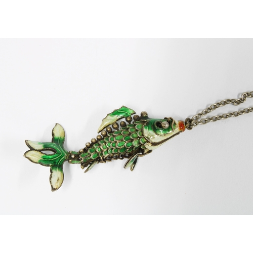 44 - An articulated white metal and coloured enamel fish pendant on chain, 5.5cm