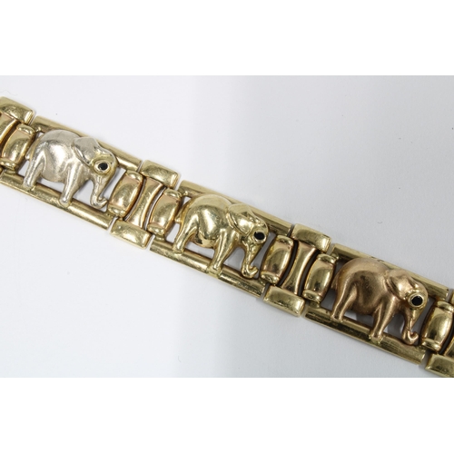 63 - Gold bracelet with six elephants with gemset eyes, stamped Italy 9kt