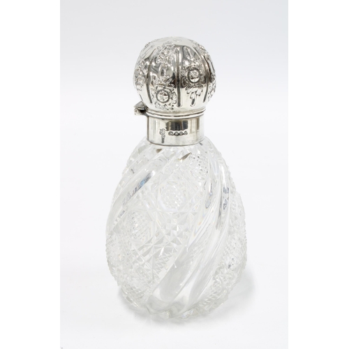 7 - Victorian silver and silver gilt cut glass scent bottle, London 1889, 14cm high