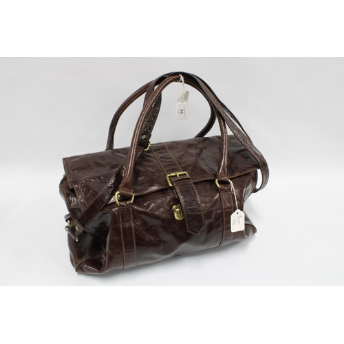 75 - Brown leather hold bag containing a collection of silver and costume jewellery, etc (a lot)