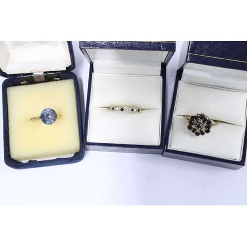 15 - Five 9ct gold gemset rings and a gold plated dress ring (6)