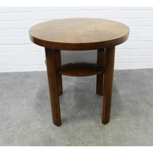 208 - An Art Deco two tier table with circular veneered top and stylised legs, . 61 x 60cm.