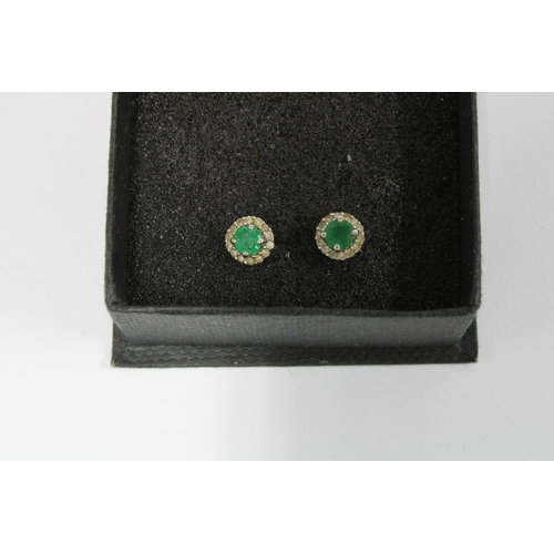 30 - 9ct gold topaz dress ring, pair of 9ct white gold emerald and diamond stud earrings and a 9ct white ... 