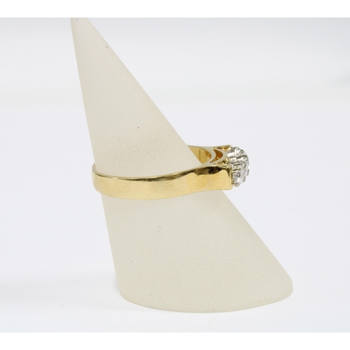 32 - 9ct gold dress ring claw set with a row of four brilliant cut diamonds, stamped 18ct, size P1/2