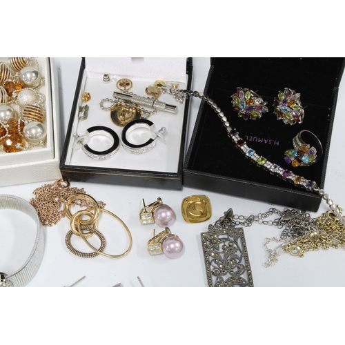 40 - A collection of designer and costume jewellery to include a pair of Armani hoop earrings, Tiffany & ... 