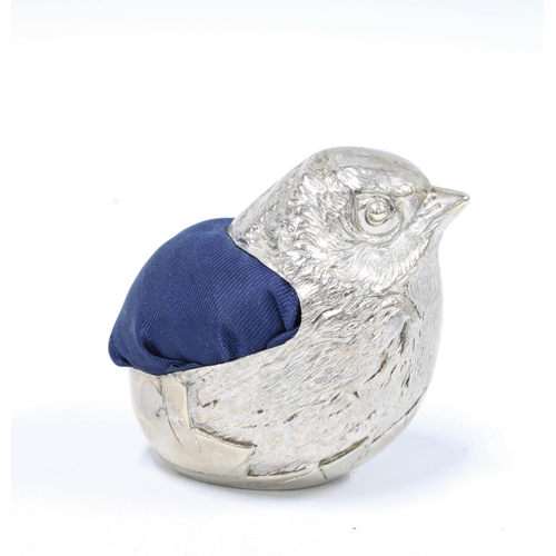 52 - Edwardian silver pin cushion in the form of a bird emerging from an egg, by Sampson Mordan & Co, Che... 