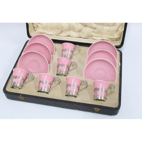 58 - George V Aynsley silver-mounted demitasse coffee set, decorated in gilt and pink, London 1920, in fi... 