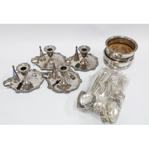 60 - A collection of Epns wares to include a pair of wine coasters, set of four chambersticks and miscell... 