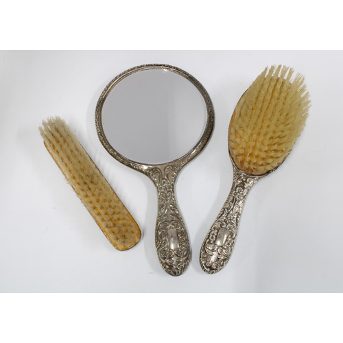 10 - Three piece silver backed dressing table brush set, Birmingham 1971 (3)