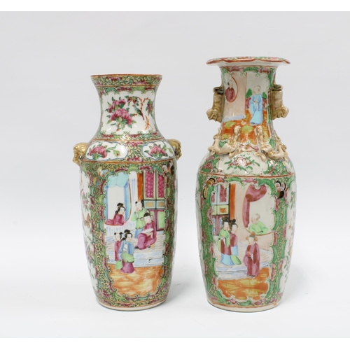 100 - Two Chinese canton  famille rose vases, each typically decorated with panels of figures, birds and i... 