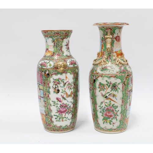 100 - Two Chinese canton  famille rose vases, each typically decorated with panels of figures, birds and i... 