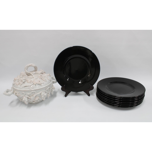 103 - A white glazed tureen and cover and set of eight large black glazed plates (9) 34cm.