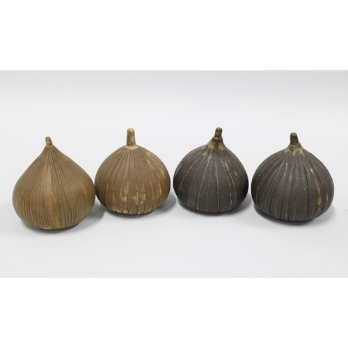 113 - Set of four studio pottery garlic shaped bulbs with incised decoration (4) 8cm.