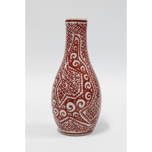 114 - Delft red and white vase in the iznik style, 16cm.