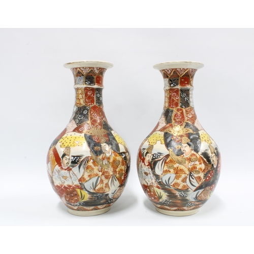 119 - A pair of Japanese earthenware vases, typically decorated with figures and stylised motifs (2) 30.5c... 