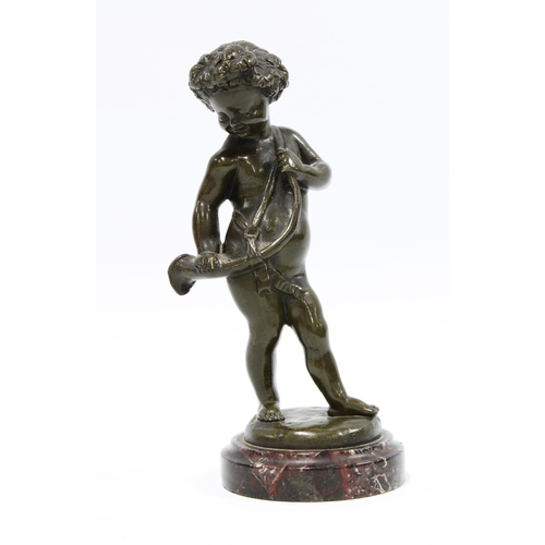 121 - After Claude Michel called Clodion (French 1738-1814) a bronze figure of a cherub on a marble plinth... 