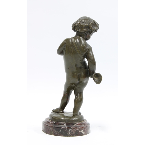 121 - After Claude Michel called Clodion (French 1738-1814) a bronze figure of a cherub on a marble plinth... 