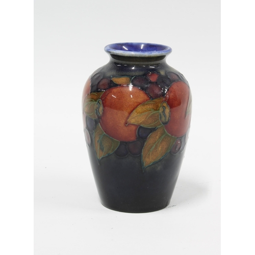 123 - Moorcroft Pomegranate vase, blue ground and impressed marks, 9.5cm.