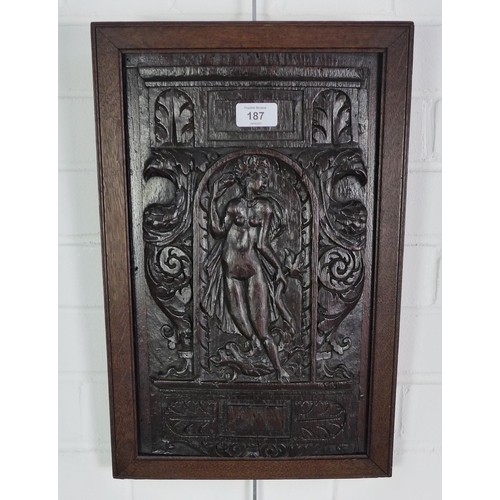 187 - French antique walnut panel carved with an architectural niche and figure of Amphitrite . 47 x 30cm.