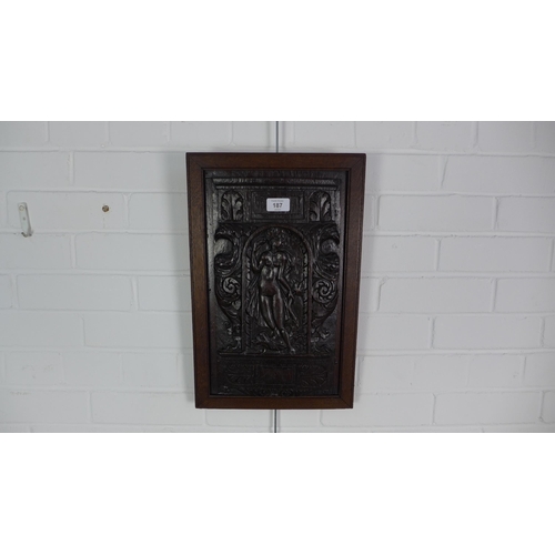 187 - French antique walnut panel carved with an architectural niche and figure of Amphitrite . 47 x 30cm.