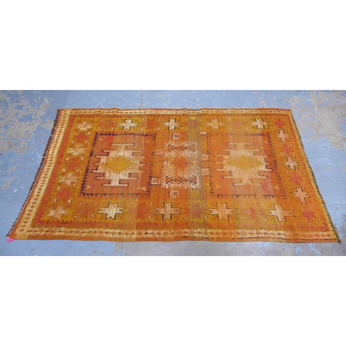 206 - Mid 20th century Moroccan rug, orange field with three medallions and star motifs,  , 243 x 137cm