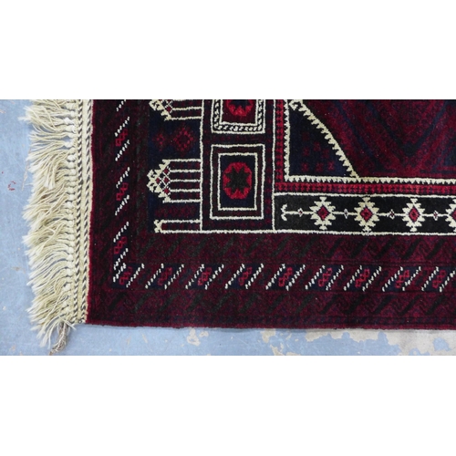 218 - Afghan prayer rug, red field with ivory mihrab, fringed ends, 138 x 85cm