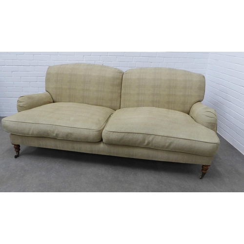 226 - Contemporary two seater settee of traditional design, upholstered in beige with a gold sheen, on mah... 