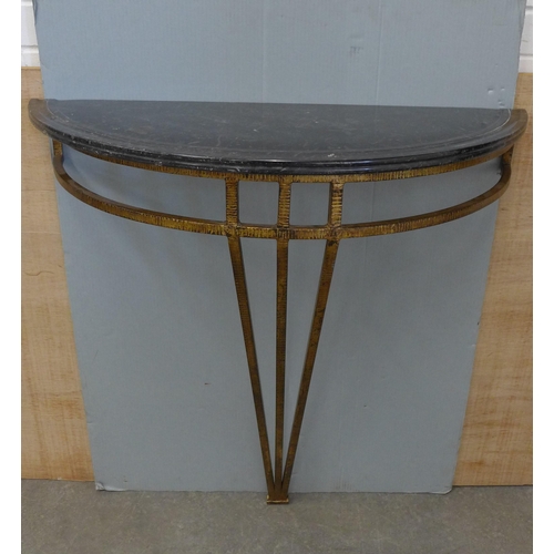 235 - A pair of contemporary consol tables with black marble demi lune tops on bronze open bases . 84 x 80... 