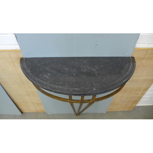 235 - A pair of contemporary consol tables with black marble demi lune tops on bronze open bases . 84 x 80... 