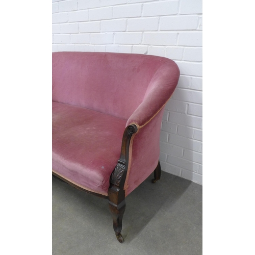 237 - Late 19th century mahogany framed two seater settee, with scroll arms and leaf carved legs, pale red... 