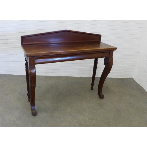 243 - Late 19th / early 20th century mahogany ledge back table, cabriole front legs,  112 x 130 x 45